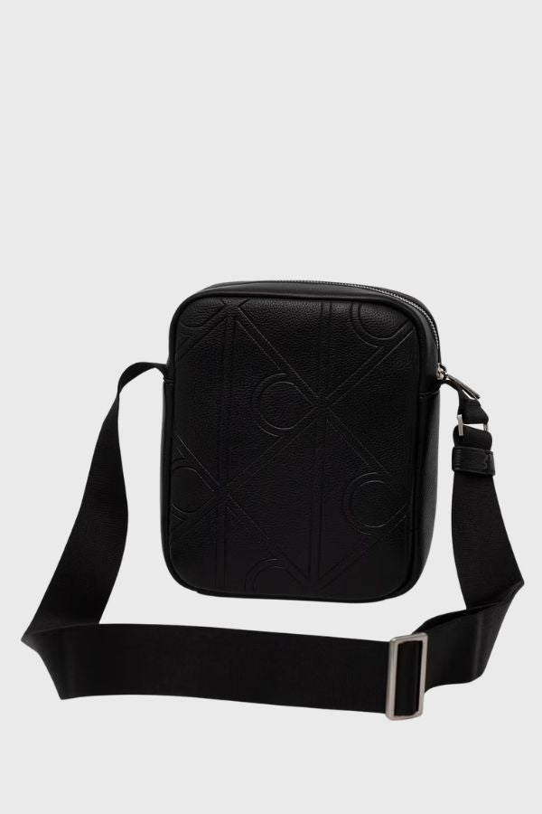 Calvin Klein Emblem Aop Emboss Reporter LV04D3331G