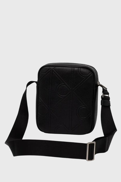 Calvin Klein Emblem Aop Emboss Reporter LV04D3331G