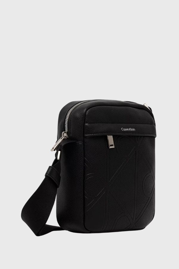 Calvin Klein Emblem Aop Emboss Reporter LV04D3331G